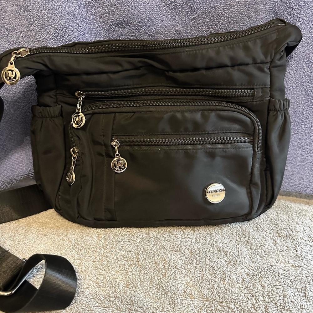 JieLShi Black Crossbody Bag with Silver Accents
